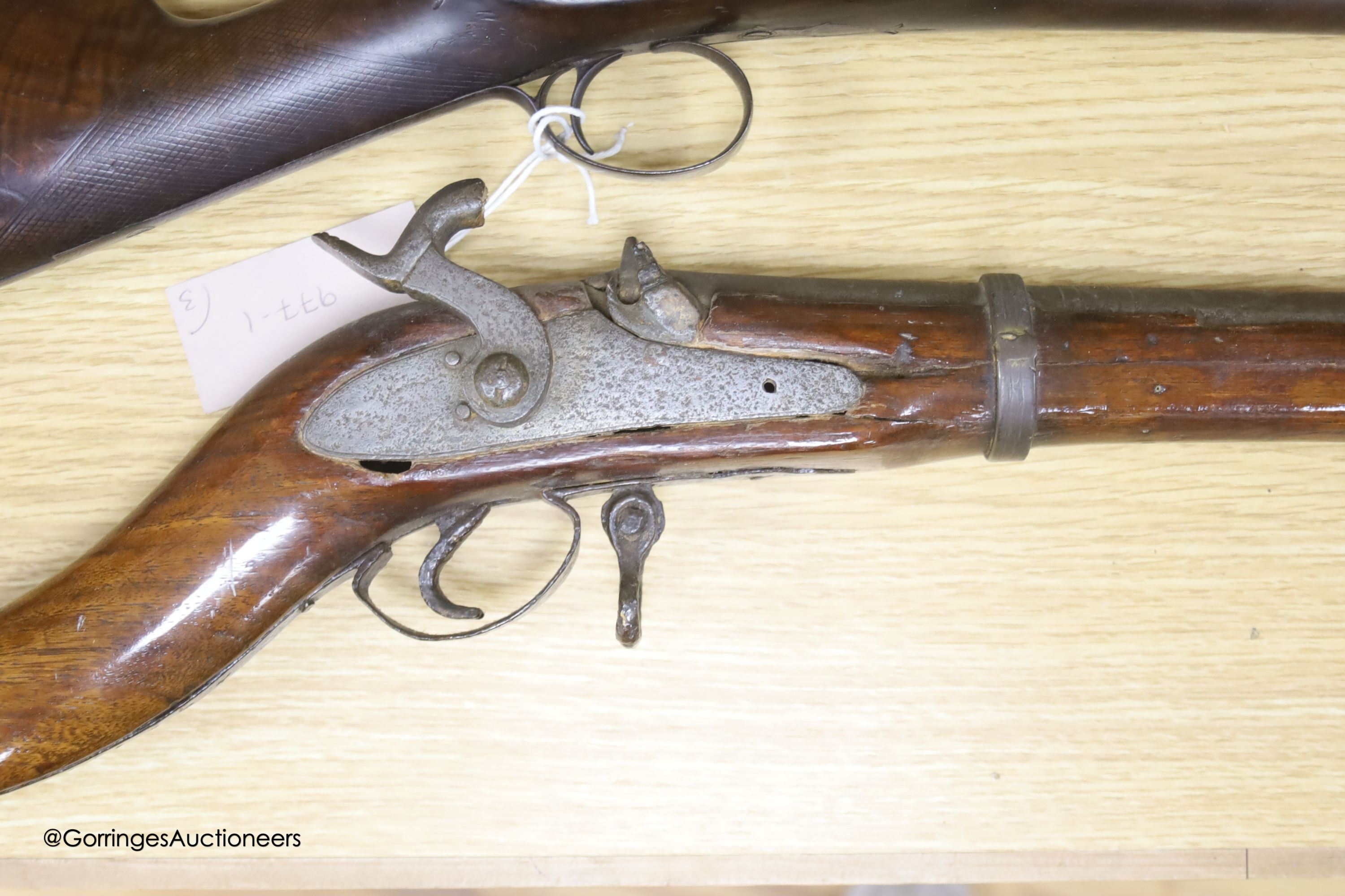 An Indian percussion rifle, an Afghan percussion rifle and a European percussion rifle, longest 140cm